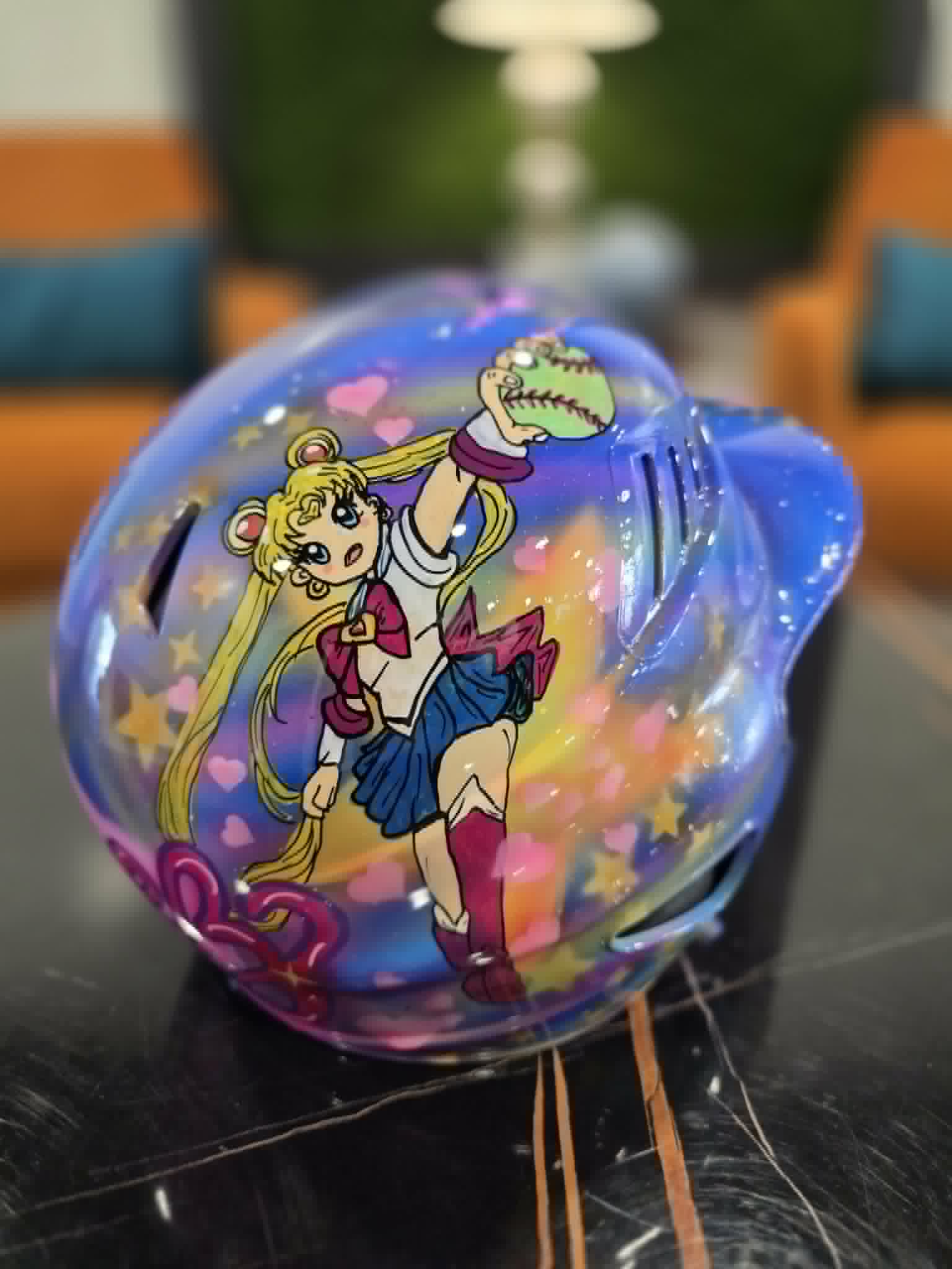 Custom-painted Sailor Moon themed softball helmet